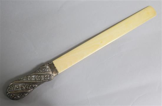 A late Victorian repousse silver handled ivory page turner, London, 1890, 37.9cm.
